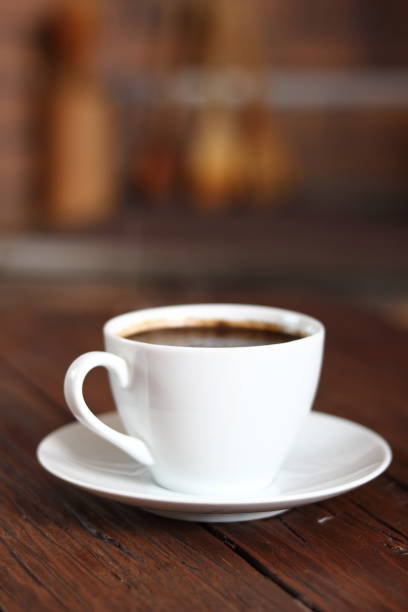 istock Coffee Cup on wooden plank table 683952466