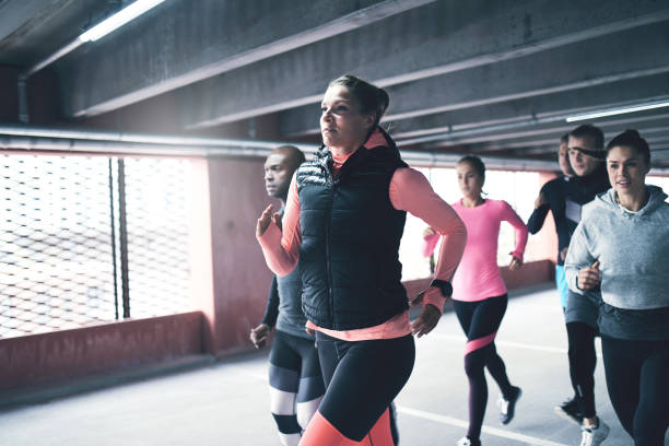 istock Team of athletes running. 683954700