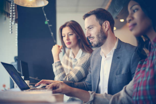 istock Business people. Business people working  together in office. 683955340