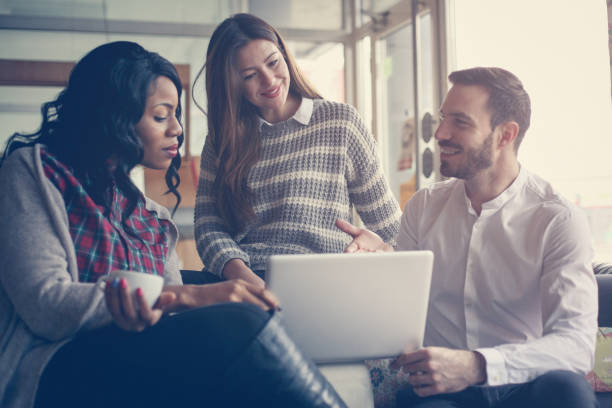 istock Business people. Three colleagues working on laptop. 683956224