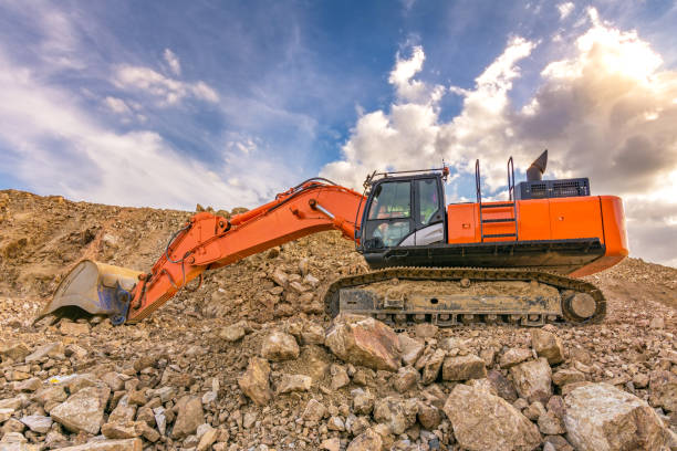 istock Outdoor quarry with heavy machinery 683956880