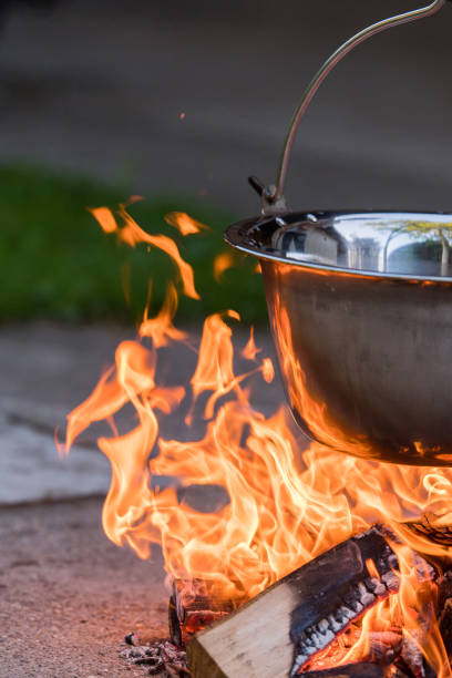 istock Kettle on the fire - cooking in the nature 683957570