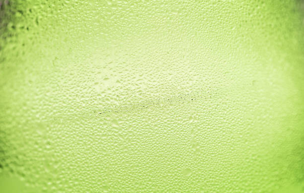 istock Green Abstract Water Drops Background,Natural water drops on glass,water drop texture 683962132