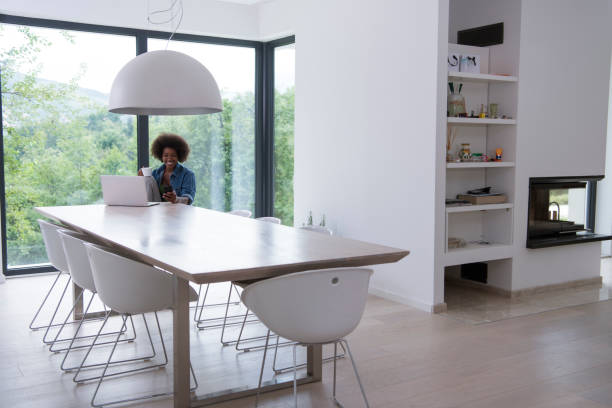 istock African American woman  using laptop at home 683962724