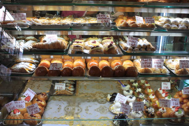 istock Various type of cakes in shop window in Italy 683963068