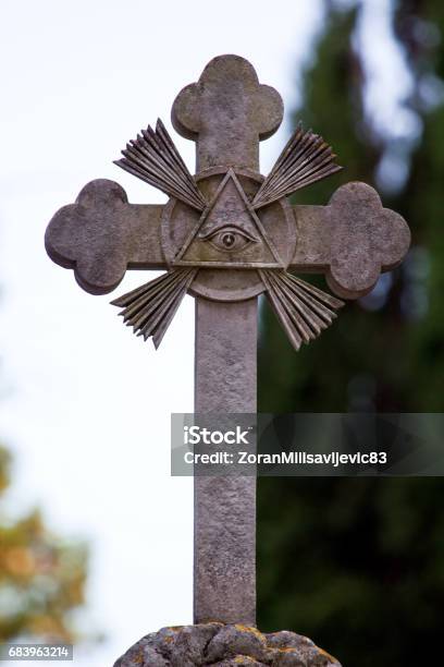 Part Of Stone Cross With Masonic Motives On The Grave Monument In Cemetery Close Up Sculpture Art Stock Photo - Download Image Now