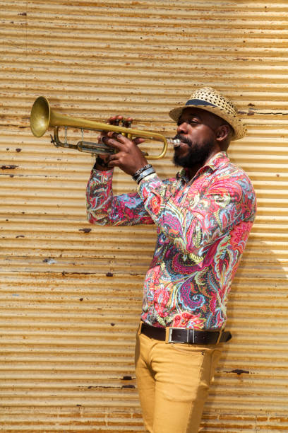istock African musician playing trumpet 683966068