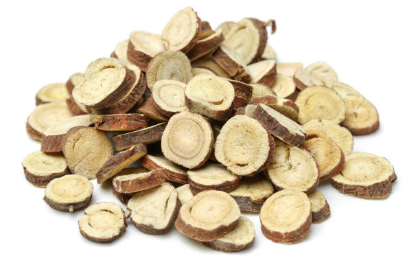 istock Licorice roots （dried liquorice roots ）on white background 683969646