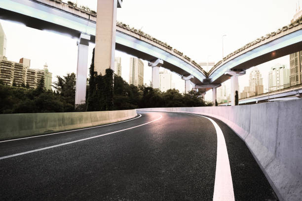 istock Empty road floor with city overpass viaduct bridge 683972826