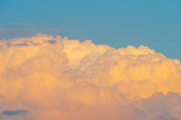 istock Clouds in a blue sky at sunrise in spring 683973114
