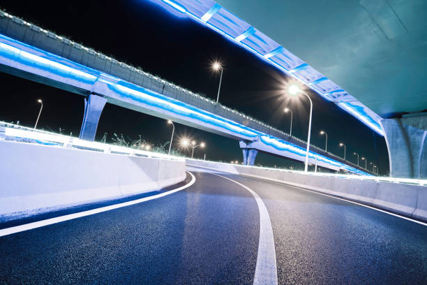 istock Empty road floor with city overpass viaduct bridge 683973878