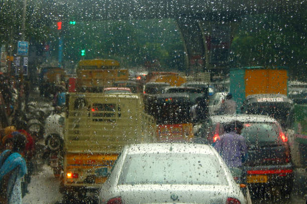 Bluured photo of Indian road traffic during rain stock photo