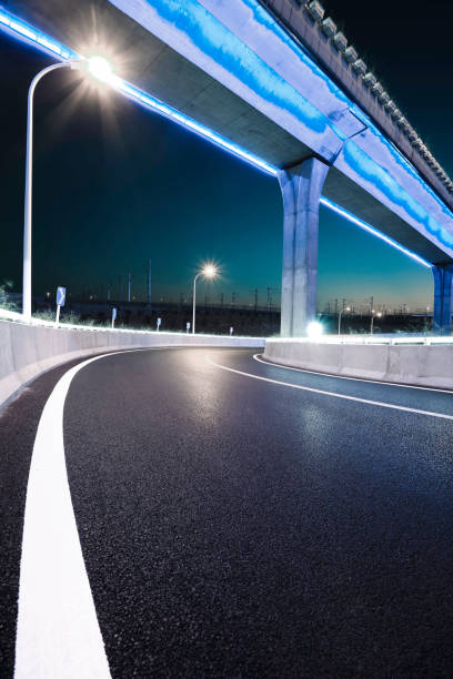 istock Empty road floor with city overpass viaduct bridge 683976458