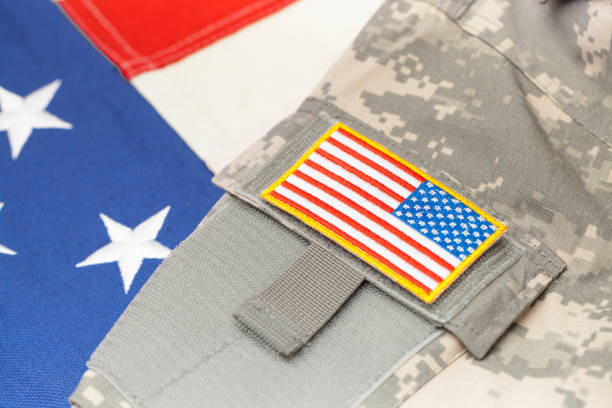 istock USA army uniform with chevron over flag - focus on chevron 683980668