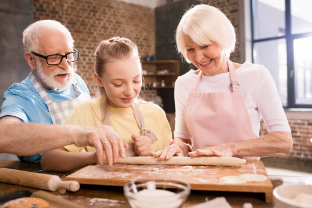 istock family kneading dough 683981076