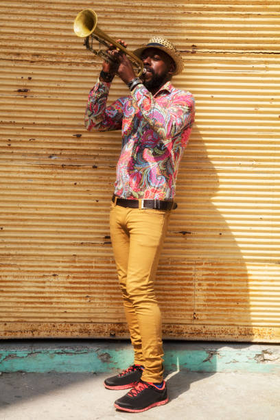 istock African musician playing trumpet 683983448