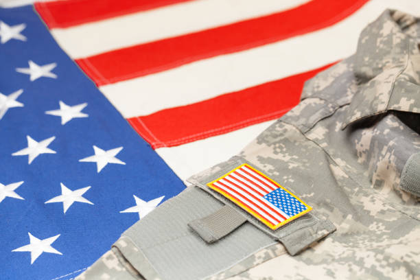 istock USA army uniform with chevron over flag 683984026
