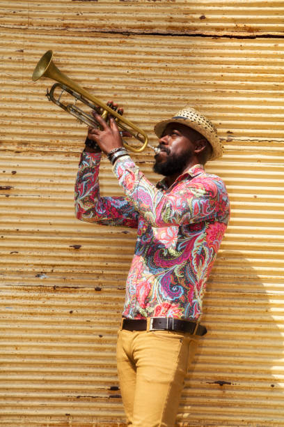 istock African musician playing trumpet 683984986