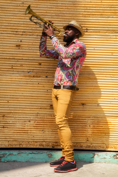 istock African musician playing trumpet 683987800