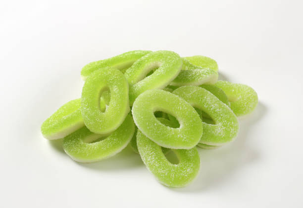 Ring-shaped apple gummies coated in sugar