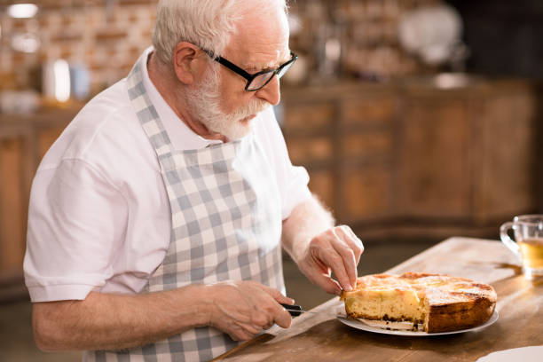 istock man cutting homemade pie 683997354