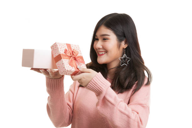 istock Young Asian woman open a gift box. 684007780