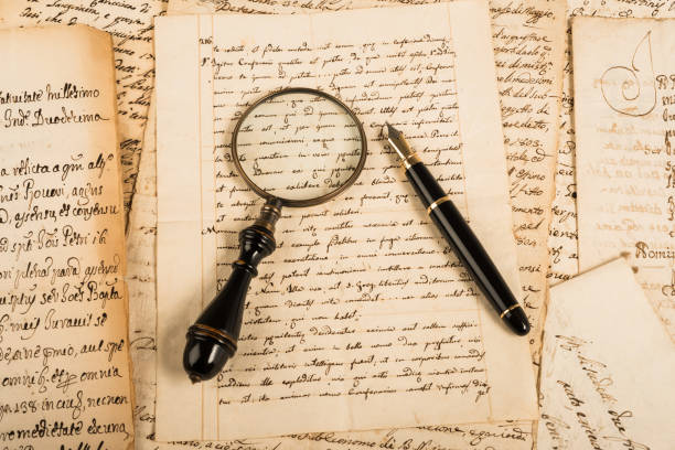 istock Fountain pen and magnifying glass 684020248