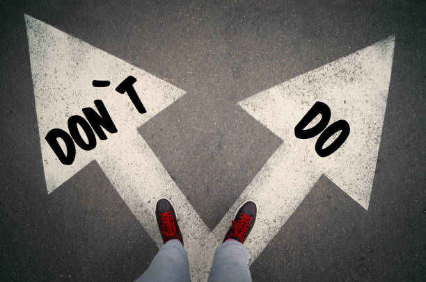 istock DO versus DON`T written on the white arrows 684025232