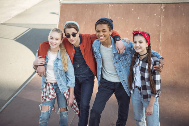 istock teenagers spending time at skateboard park 684041128