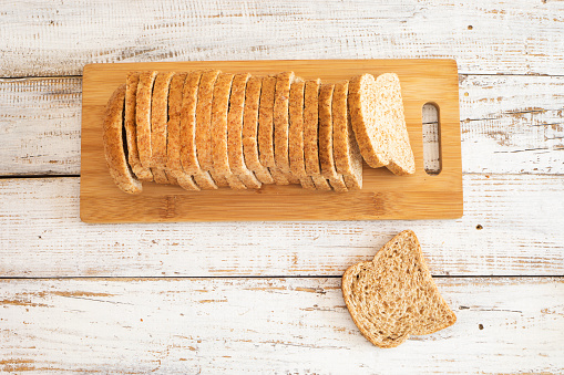 Freshly baked bread on wooden table