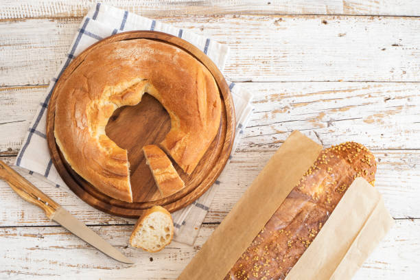 istock Freshly baked bread on wooden table 684042904