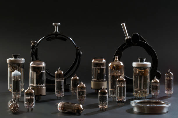 istock Radio tubes and laboratory equipment on a black background 684051038