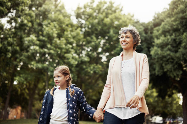 istock Grandma loves taking her on strolls through the park 684056716