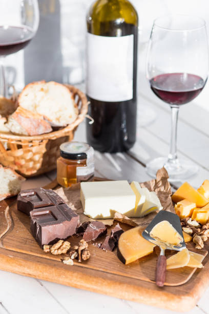istock Wine, baguette and cheese on wooden background 684071968