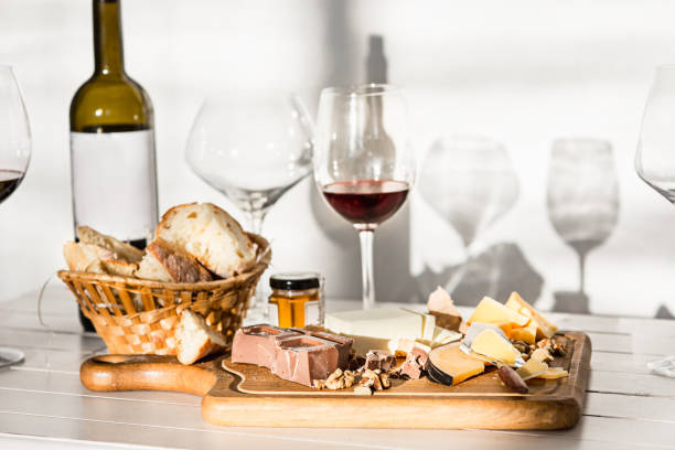 istock Wine, baguette and cheese on wooden background 684072764