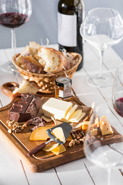 istock Wine, baguette and cheese on wooden background 684076152