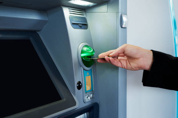 istock Drawing some cash from the ATM 684078270