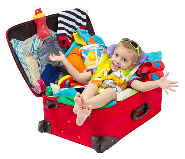 istock Baby in Suitcase, Kid inside Red Luggage Packed for Vacation, Child over White Background 684082004