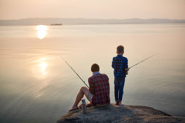 istock Father and Son Fishing at Sunset 684090174