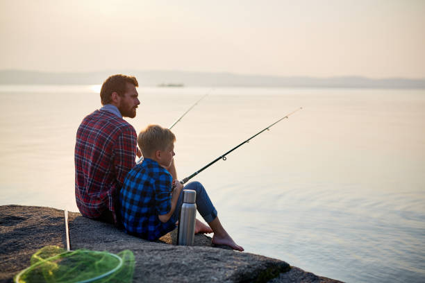 istock Father and Son Fishing at Sunset 684090192