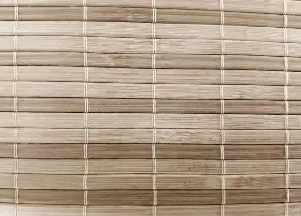 Photo of Wooden bamboo mat, sepia tone