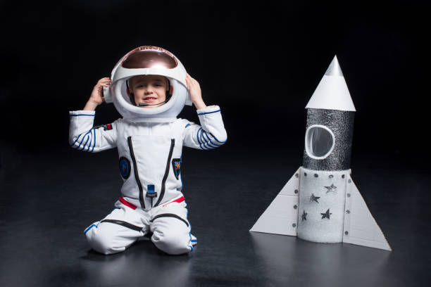 istock Boy in astronaut costume 684105108