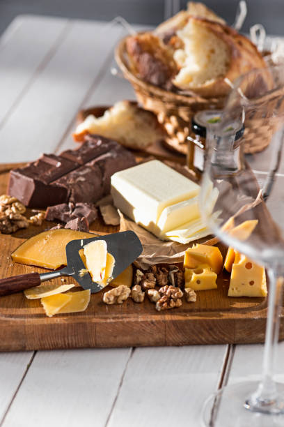 istock The different kind of cheese and walnuts on wooden background 684116202