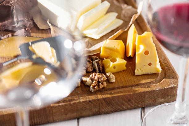istock Wine, baguette and cheese on wooden background 684122236