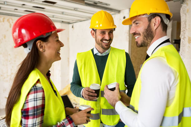 istock Team of smiling architects at coffee break 684122966