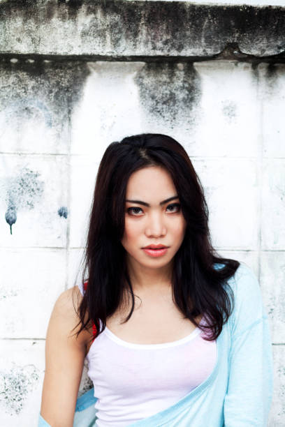 istock Filipina transgender leaning at wall 684125824
