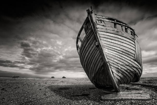 istock Boat stranded on pebbled beach. Dungeness, England 684133254