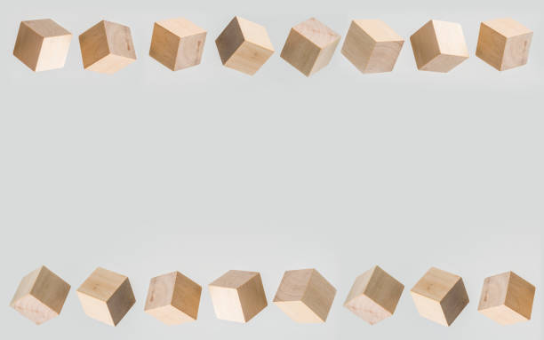 istock Abstract geometric real floating wooden cube on grey background 684133390