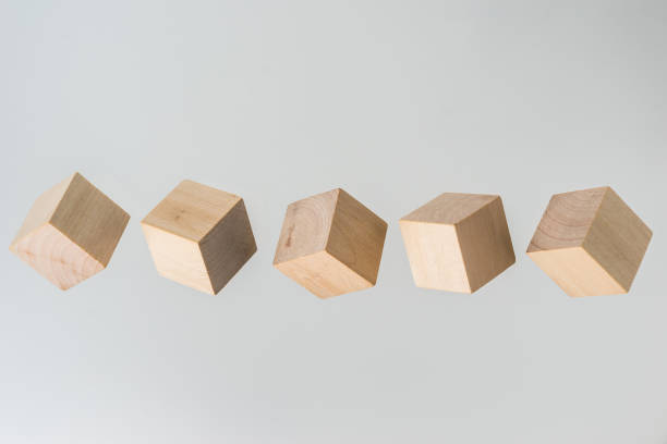 istock Abstract geometric real floating wooden cube on grey background 684133458
