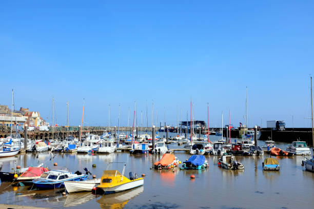 Bridlington, Yorkshire, UK. May 10, 2017.  A variety of fishing and leisure craft moored in the harbor and marina at Bridlington in North Yorkshire.